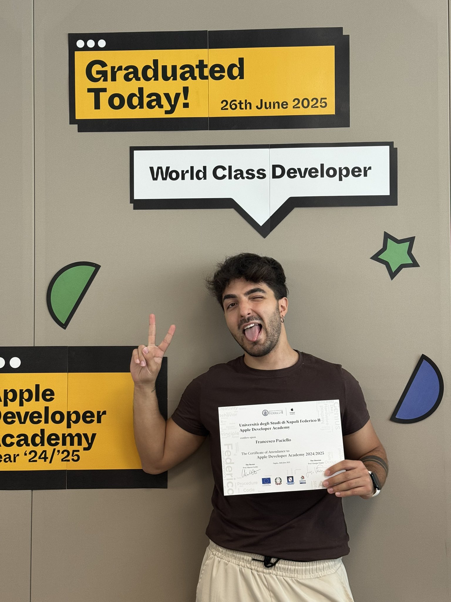Francesco Paciello holding Apple Developer Academy graduation certificate